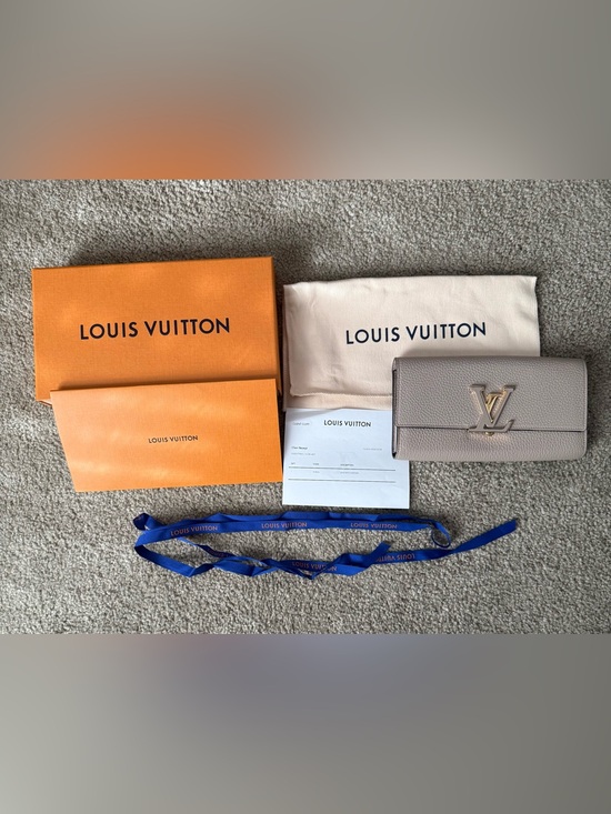 Louis Vuitton Handbags - Louis Vuitton Cream Leather Flap Clutch with Gold LV Emblem